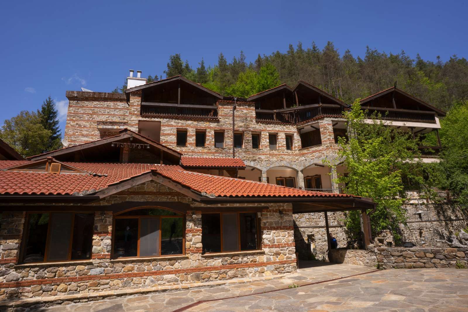 The hotel in autumn, surrounded by turning trees