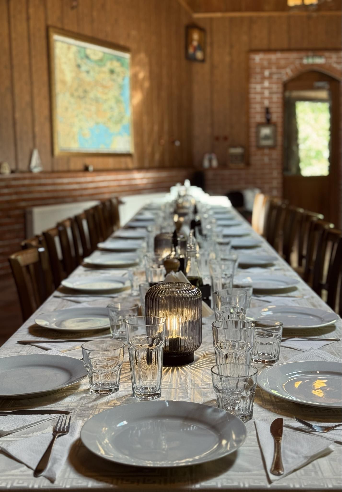 A long table laid for a group
