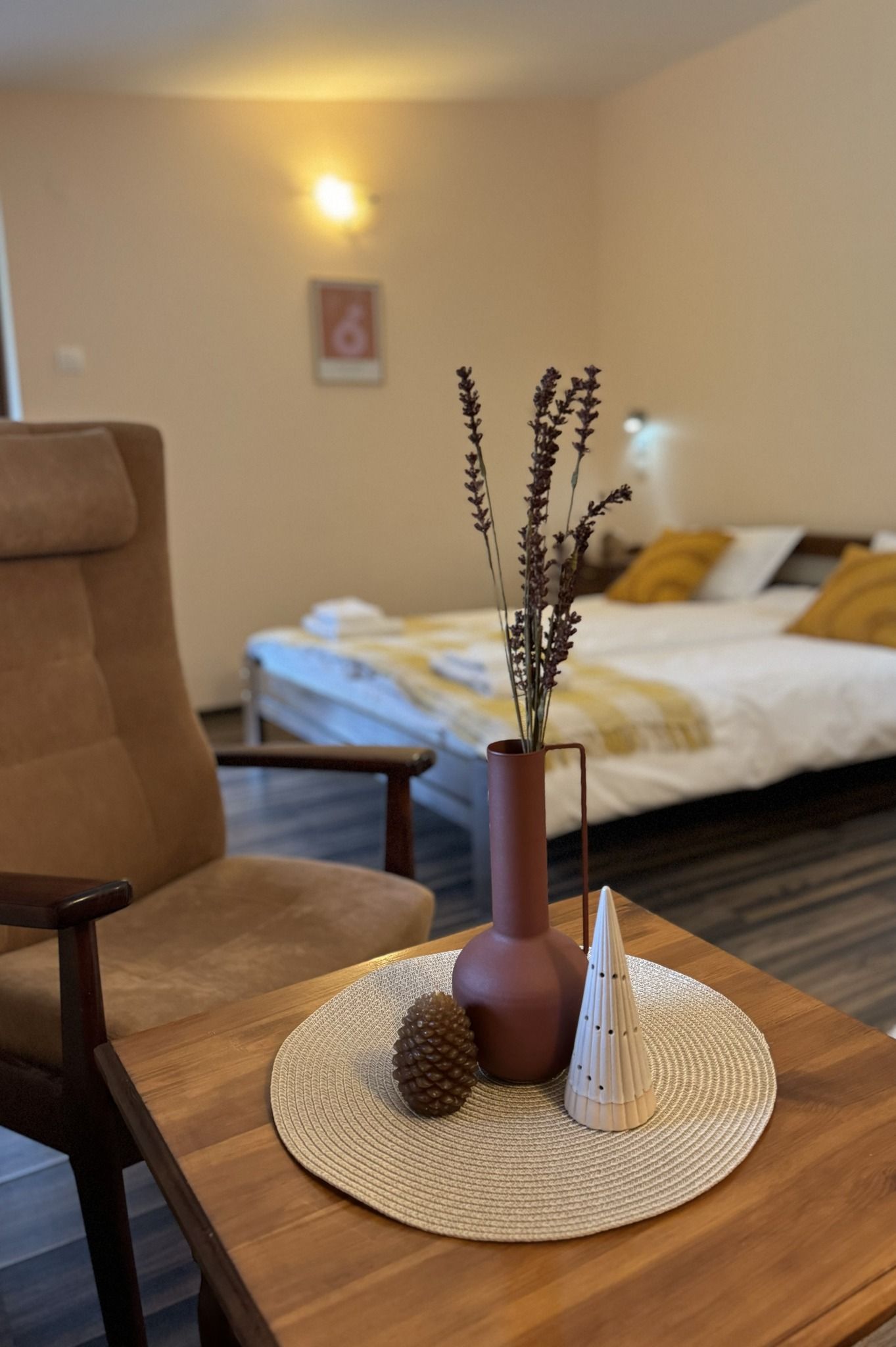 A made bed in white linen, close up