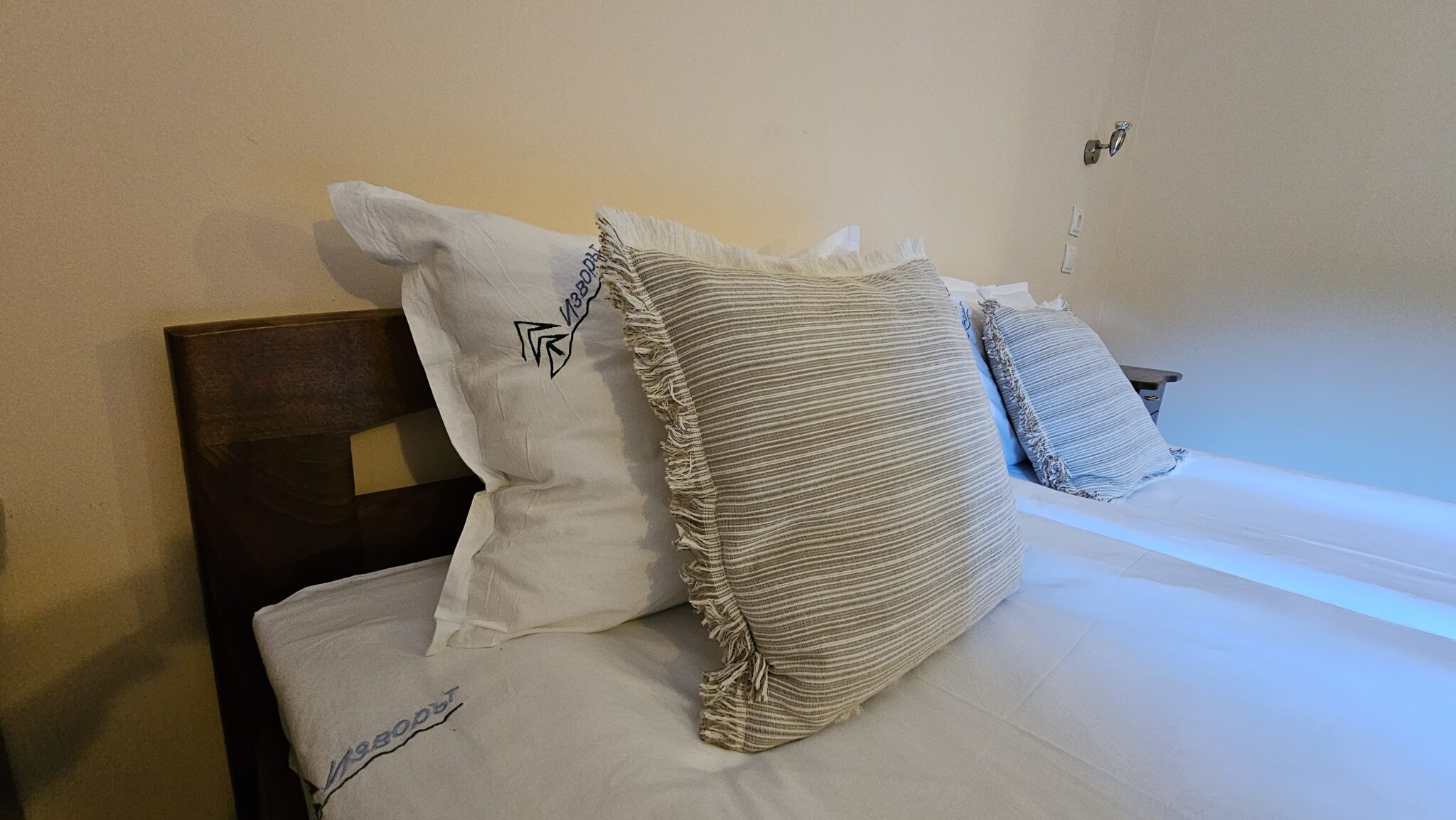 The pillows on the bed, close up