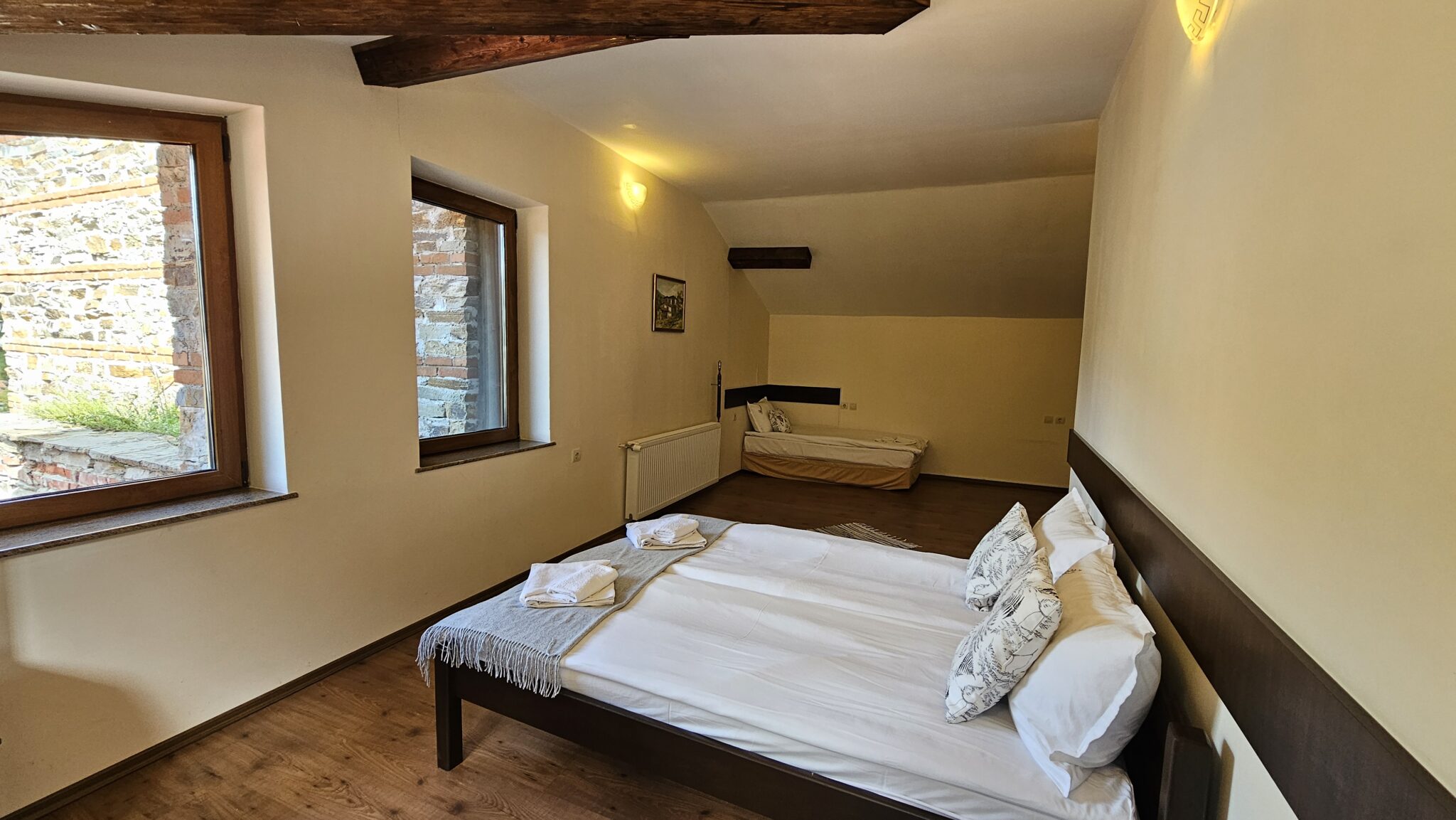 The beds and the window looking onto the village