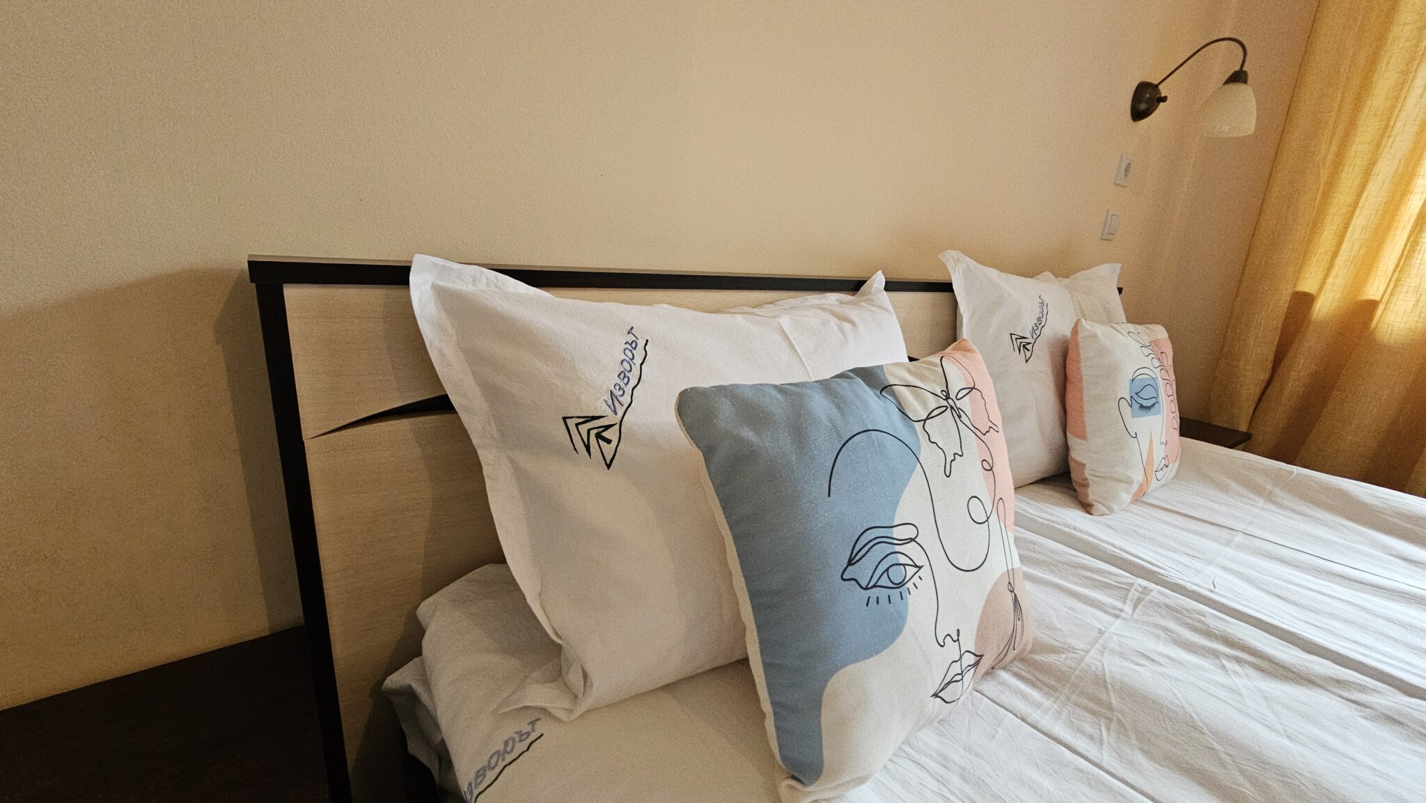 The pillows on the bed, close up